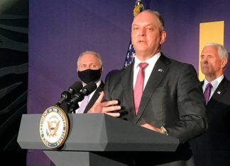 Louisiana gov. toughens COVID-19 restrictions on businesses